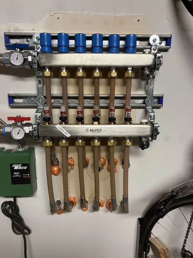 Plumber performing Water Heater Repair at a residential property in Albert Lea